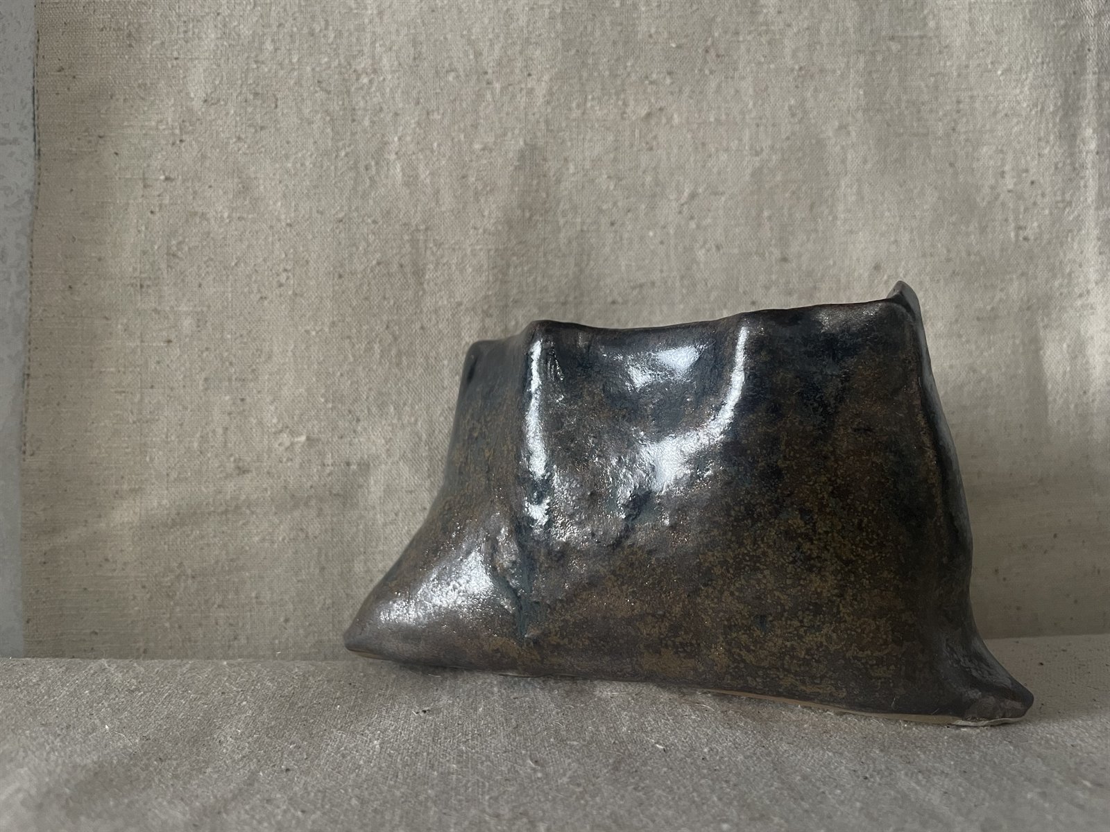Glazed tea bowl interior detail showing crystalline texture and glaze pooling