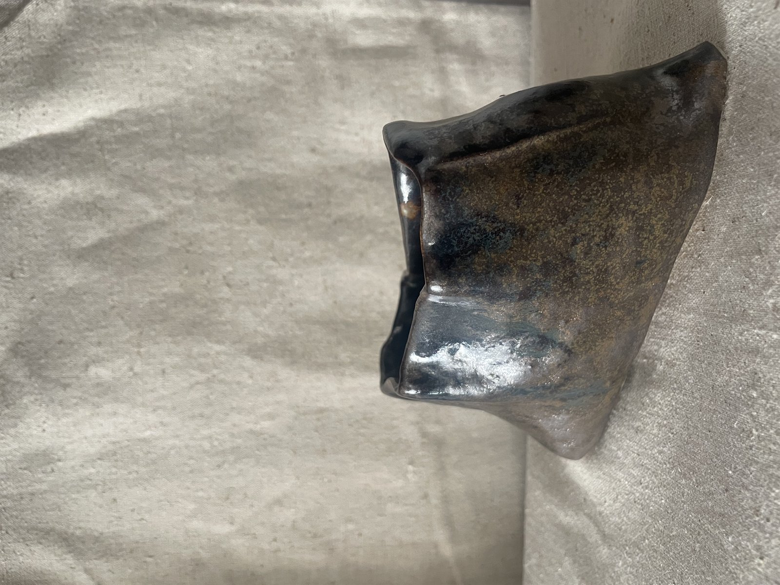 Organic ceramic form study with natural glaze break