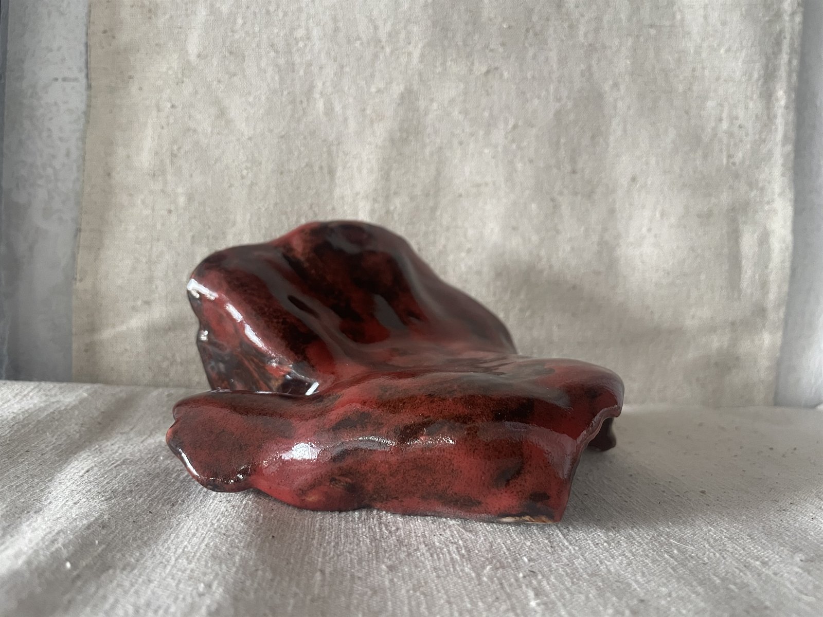 Subtle glazed small cup with exposed earthen body