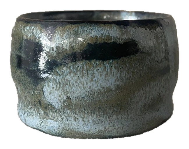 Rounded ceramic vessel with black and pale blue-green glaze