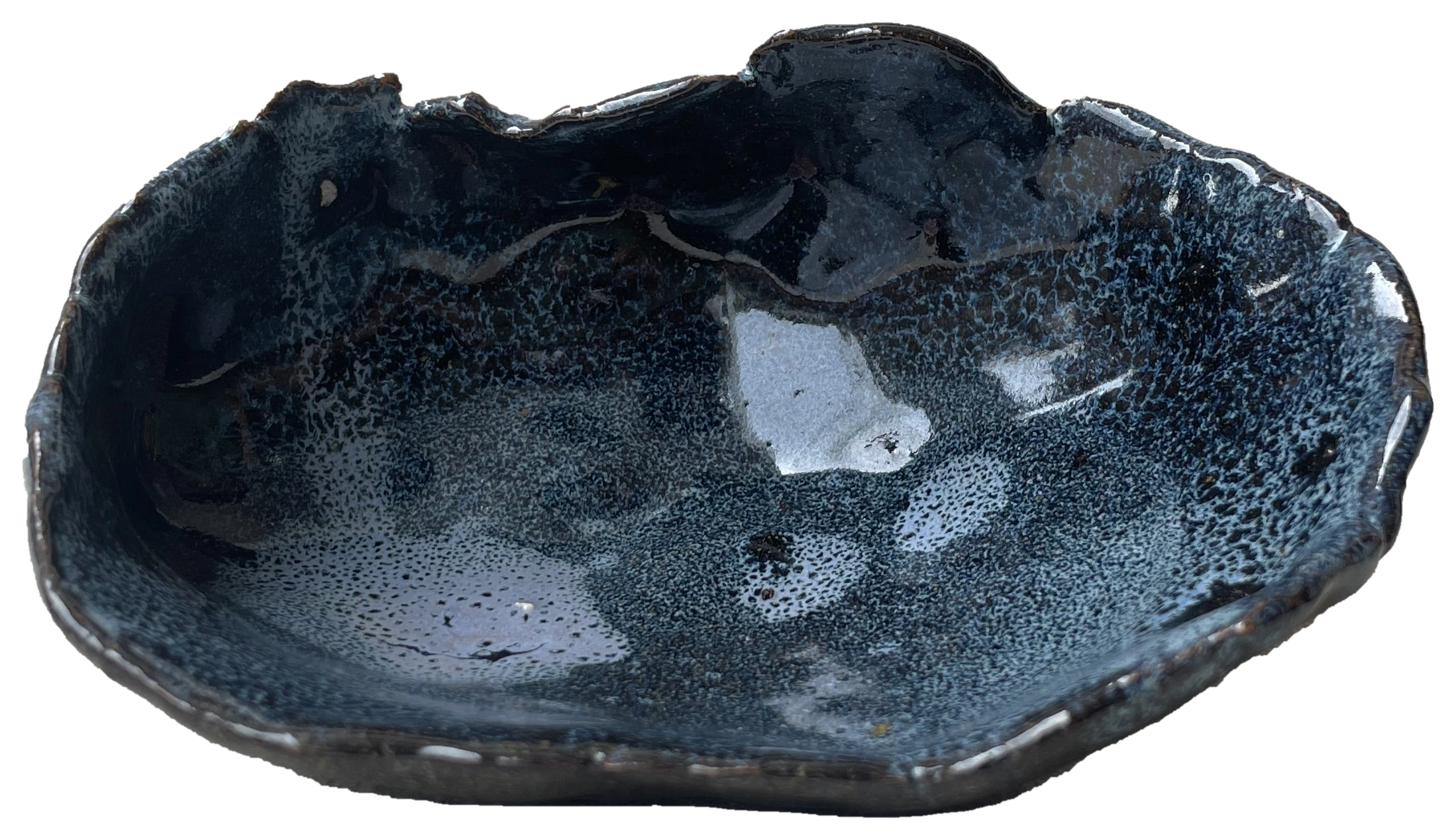 Dark blue ceramic bowl with a folded irregular edge